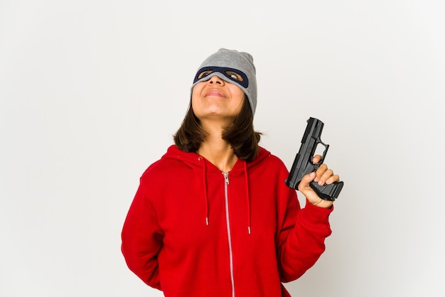 Фото Молодой гангстер женщина держит пистолет