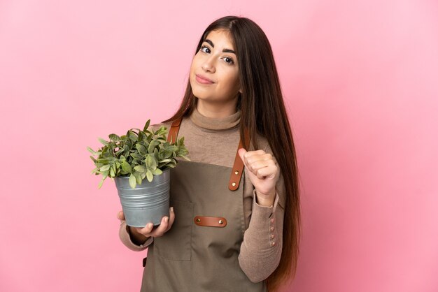 Young gardener over isolated background