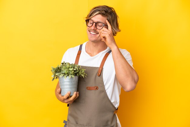 Young gardener over isolated background