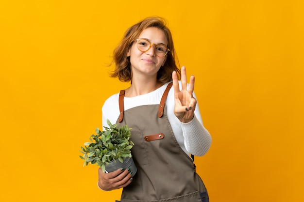 Young gardener over isolated background