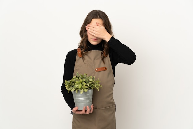 Young gardener over isolated background