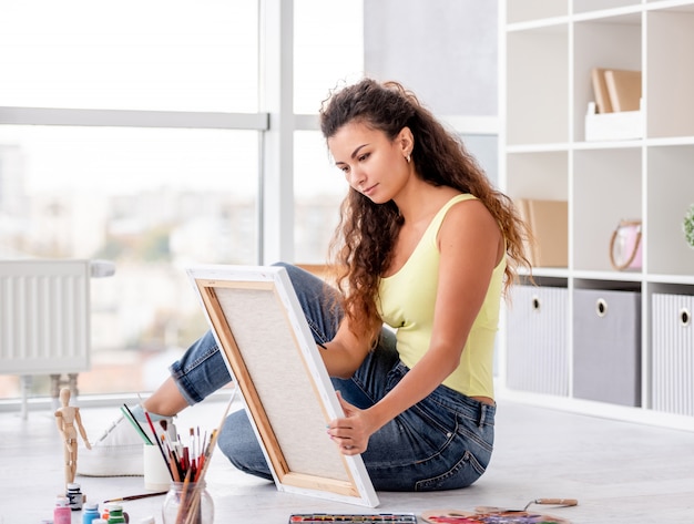 Young girl artist painting