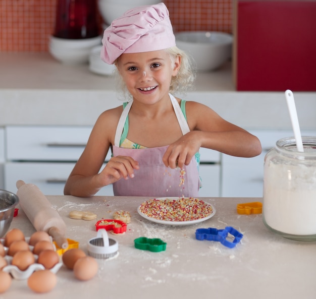 Young girl baking in at home