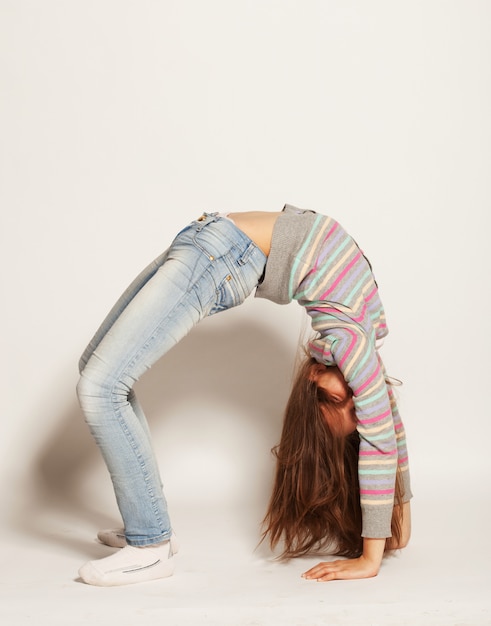 Young girl doing gymnastics