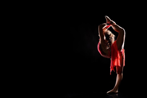 Young girl doing gymnastics