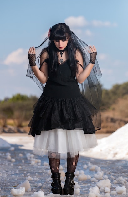 Photo young girl in gothic clothing