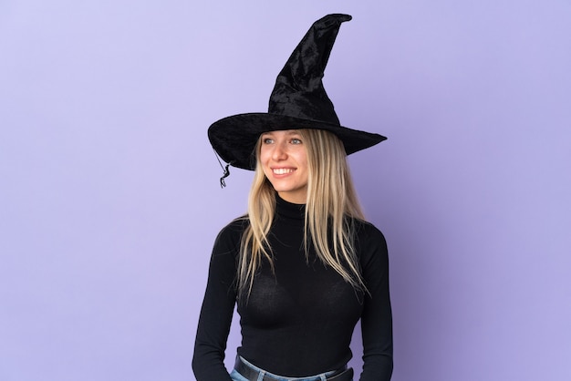 Young girl in halloween costume over isolated background