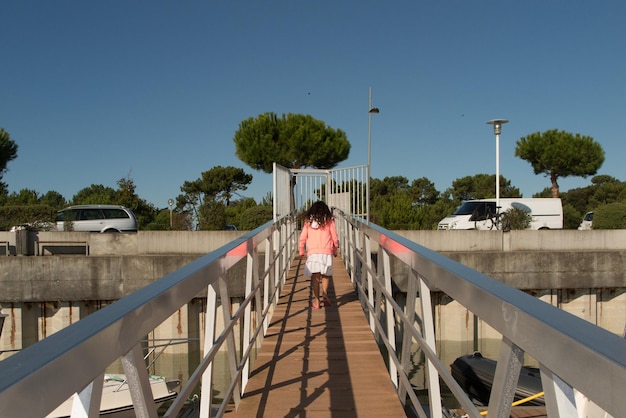 Young girl in an harbour on holidays