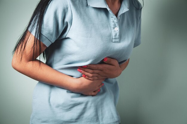 A young girl has a stomach ache