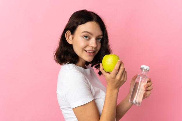 Young girl holding an apple