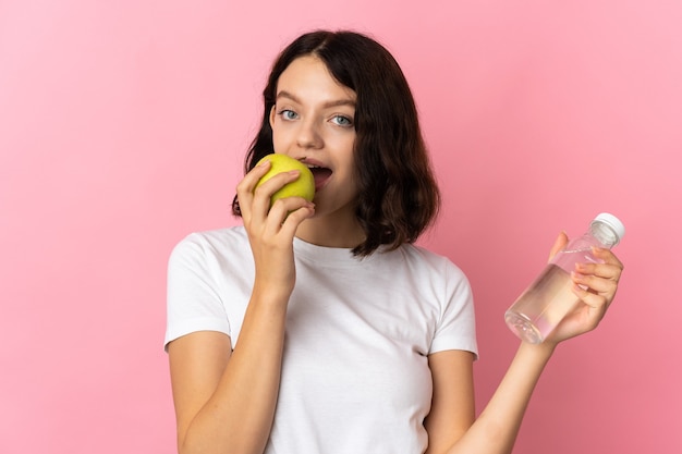 Young girl holding an apple