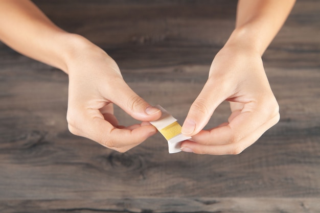 Young girl holding a band-aid