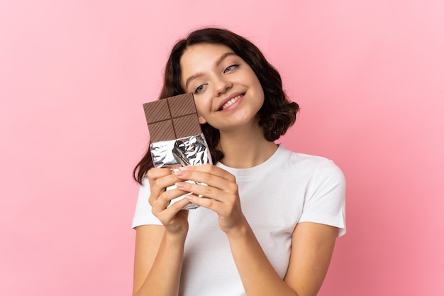 Young girl holding a chocolat