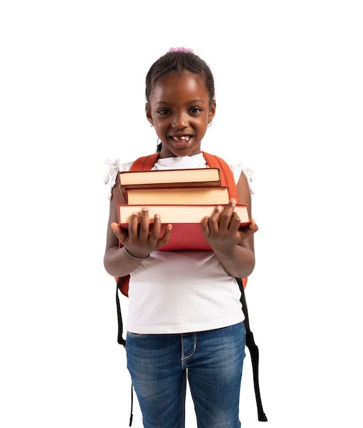 Young girl holds book and is ready to go at school