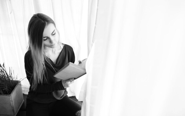 A young girl in a home setting is resting in a big apartment