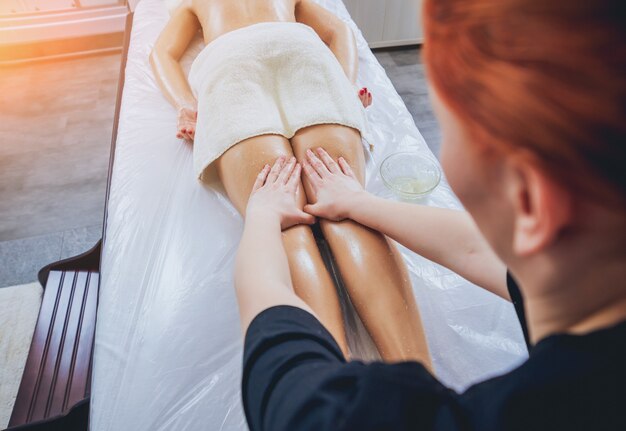 Young girl is relaxing in the spa.