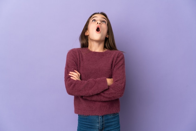 Young girl over isolated background