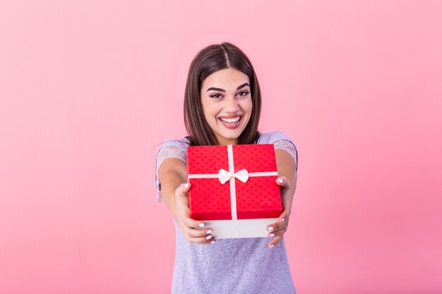 Young girl lady carrying gift box