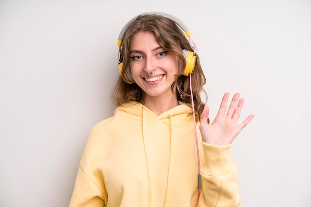 Young girl listening music with her headphones