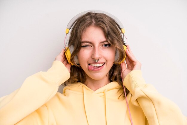 Young girl listening music with her headphones