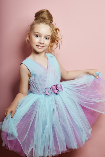 Young girl miss beauty in a beautiful dress.