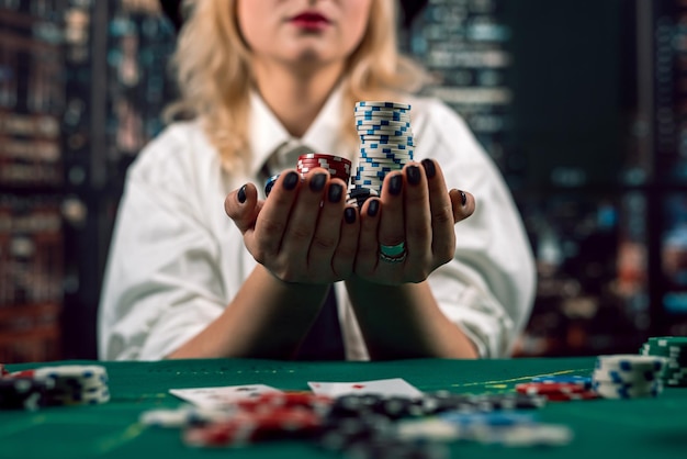 young girl player came to the casino to play poker with cards and chips poker casino