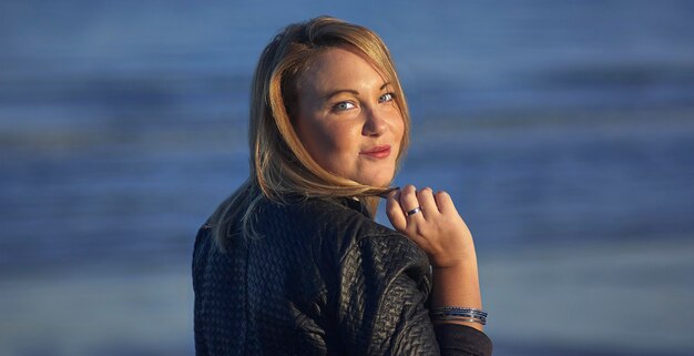 Young girl portrait in the beach 
