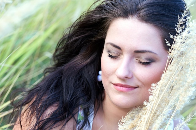 Young girl portrait on the field