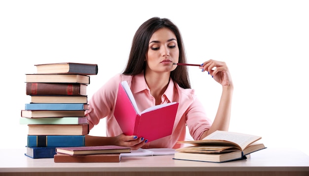 Young girl reading book isolated on white