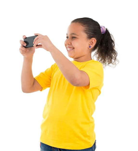 Photo young girl recording video with the phone