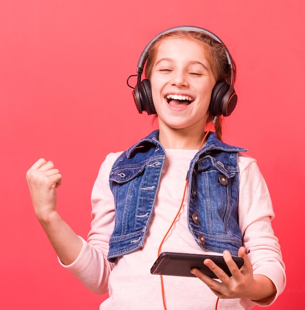 Young girl relaxing while listening to music