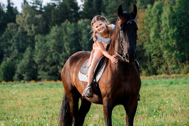 Young girl riding a horse