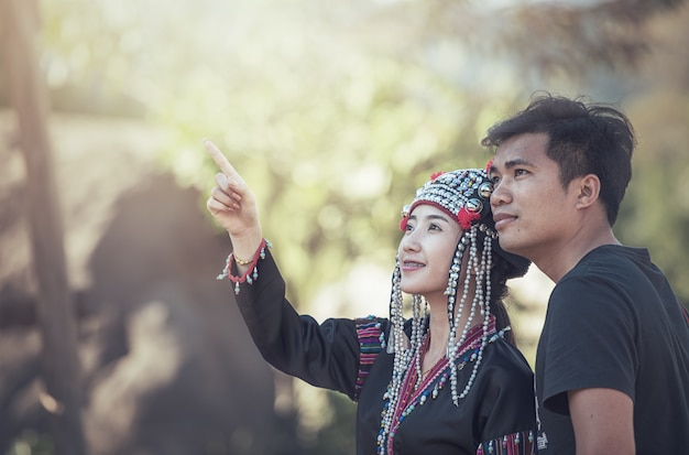 A young girl showing something to her boyfriend