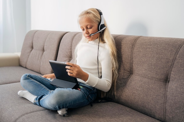 Young girl studying at home