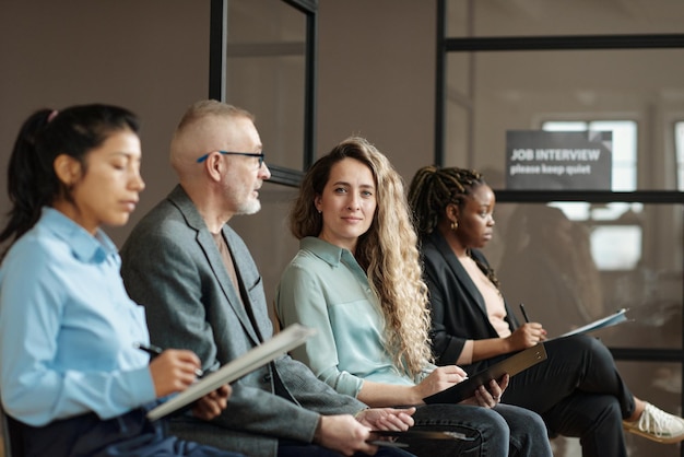 Young girl taking part at job interview