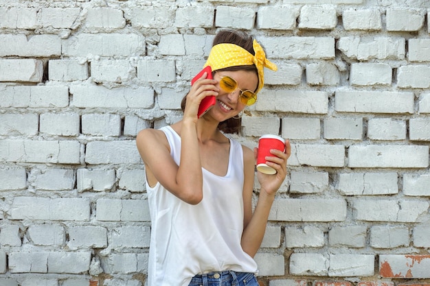 A young girl talking on the phone