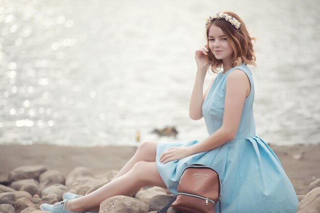 Young girl on a walk in the autumn park