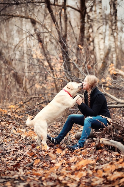 Young girl on a walk in the autumn