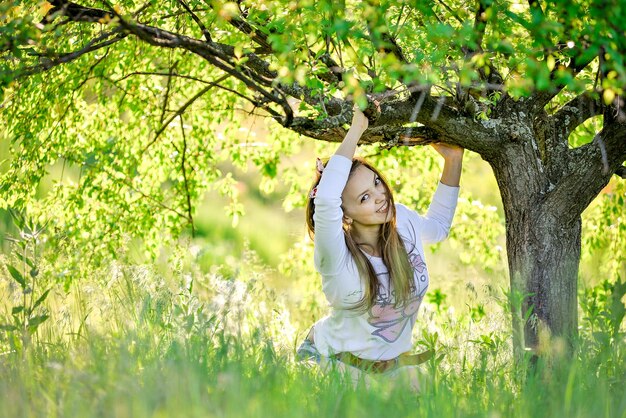 young girl walking in the garden