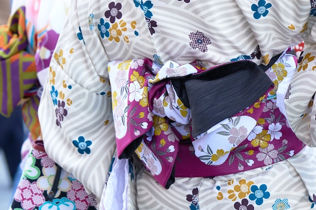 Young girl wearing Japanese kimono standing