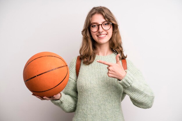 Young girl with a basketball ball sport concept