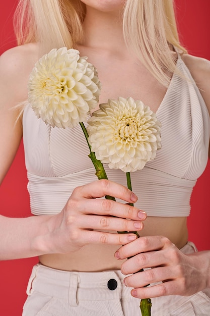 Young girl with beautiful white flowers