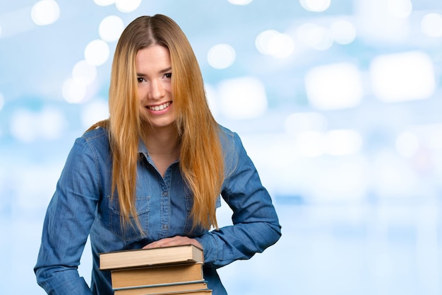 Young girl with books