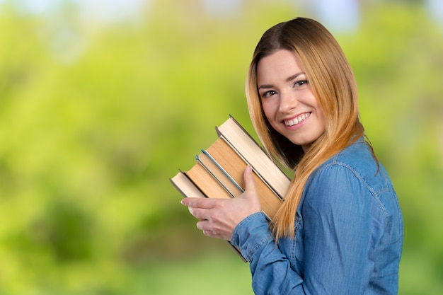 Young girl with books