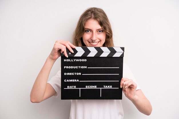 Young girl with a cinema clapper film or movie concept