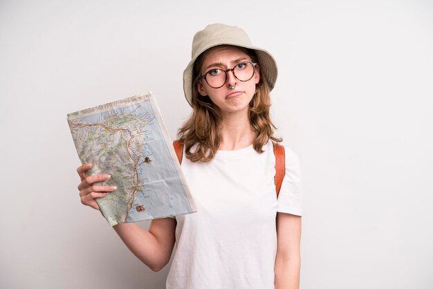 Young girl with a city map tourist concept