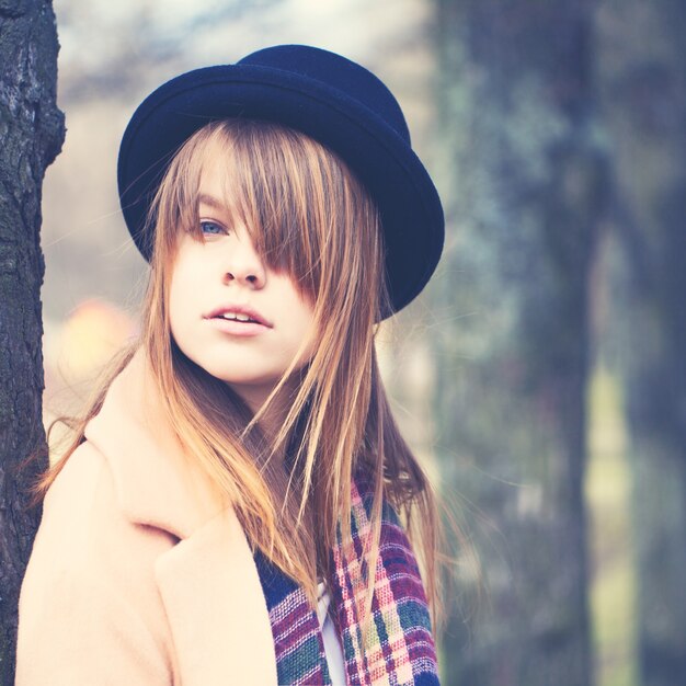 Young Girl with Coloring Hair Outdoors