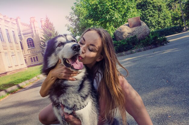 Young girl with her dog in the park