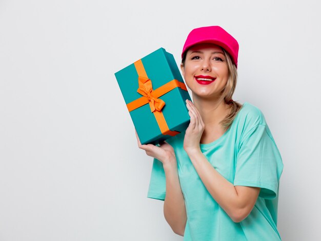 young girl with holiday present box