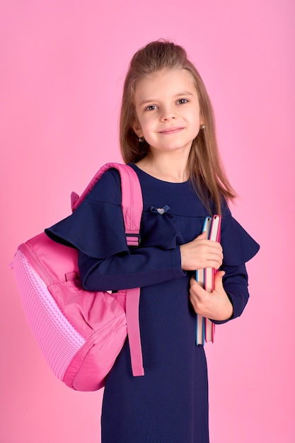 Young girl with pink backpack